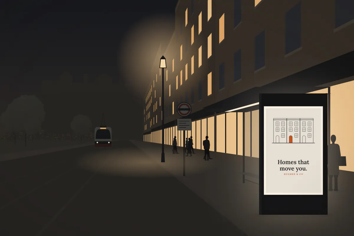 Bus shelter 6-sheet on Princes Street — at night